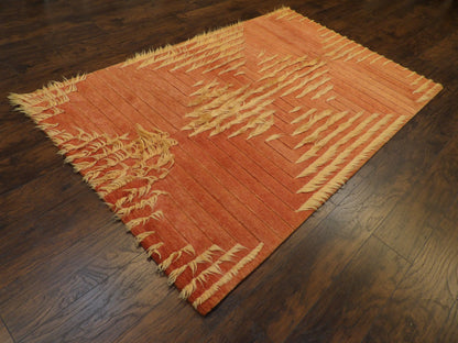 High-low shag pile texture detail, gold and rust rug