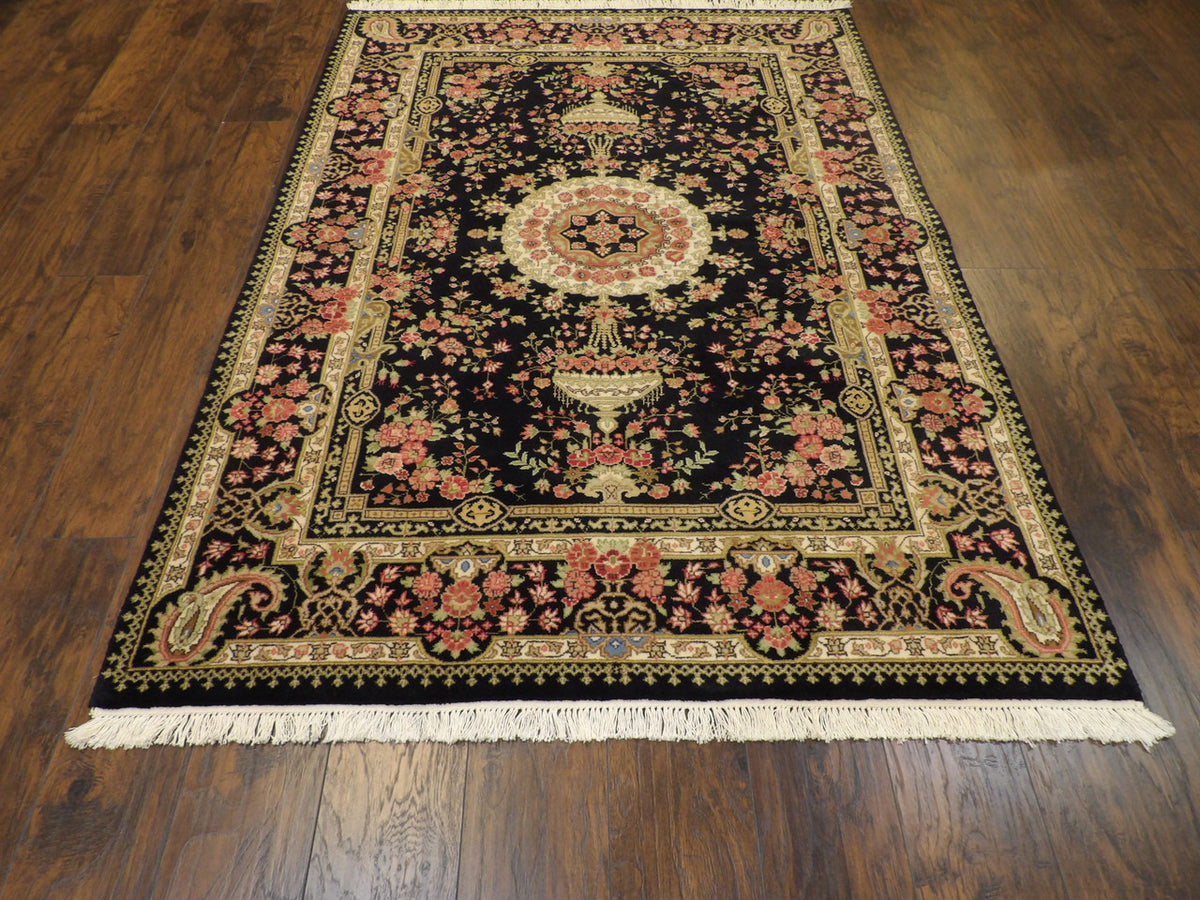 Fine Persian Qum rug corner detail