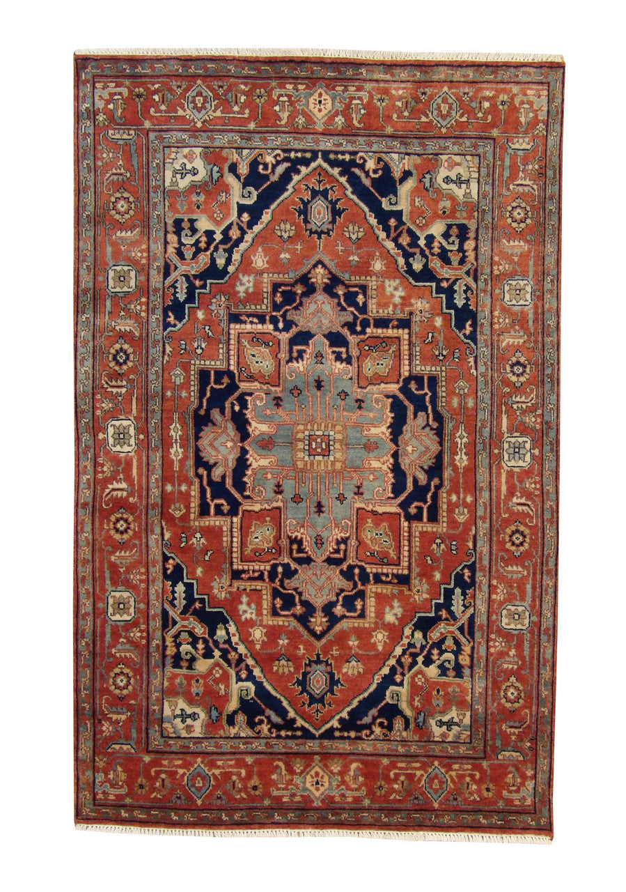 Tribal Heriz Design hand-knotted wool rug in Blue & Rust, full view