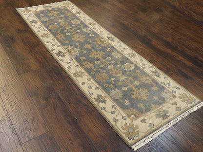 Beige Oushak runner in a hallway setting