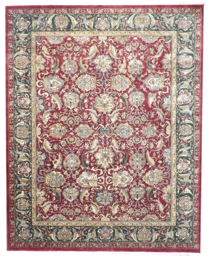 Fine Persian Kashan hand-knotted wool rug in green and red, full view