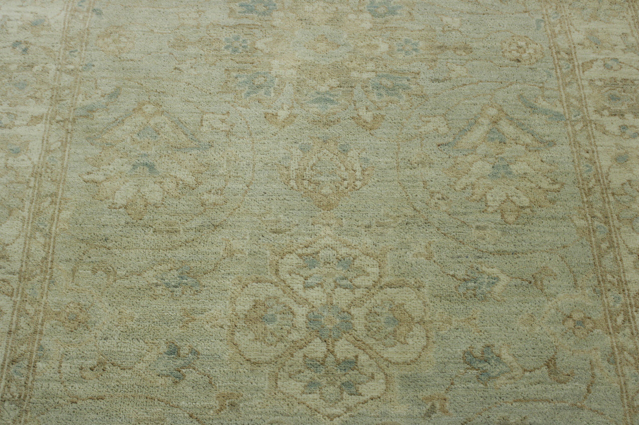 Blue & Beige Oushak Chobi rug in room setting