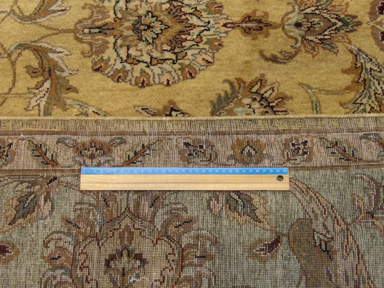 Gold & Green Fine Kashan Tie Dye rug in room setting