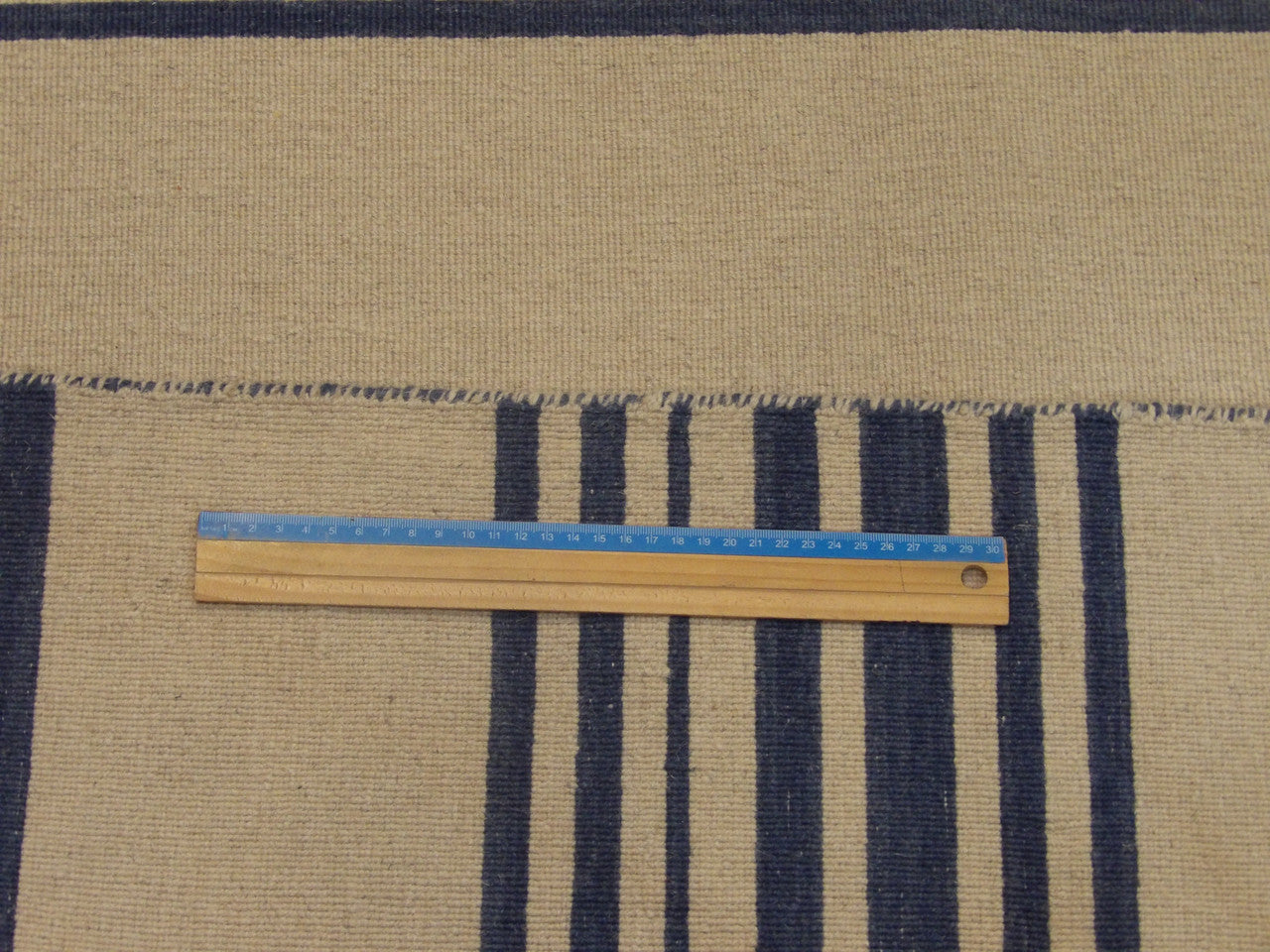 Blue & Beige Coastal Flat Weave Indoor/Outdoor Beach rug in room setting