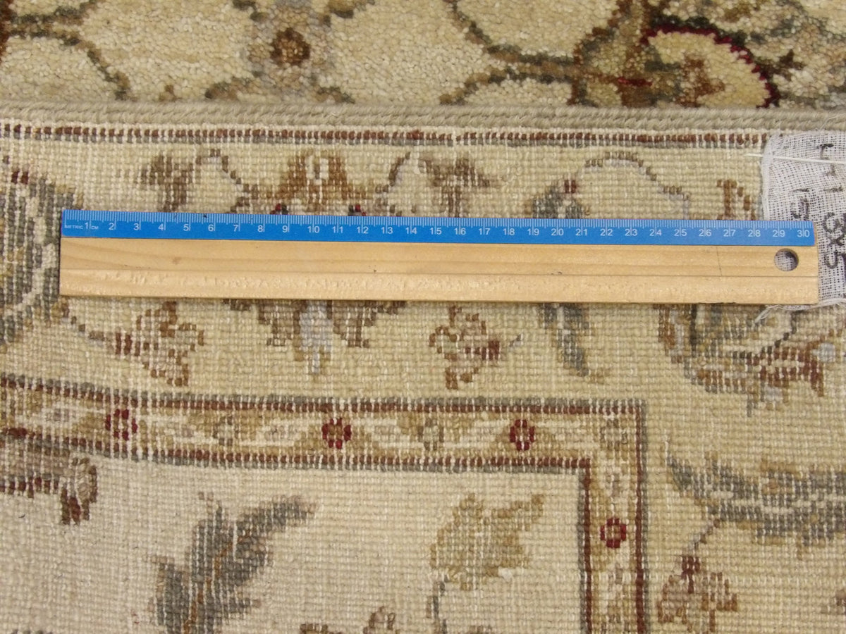 Blue and gold Chobi rug in room setting