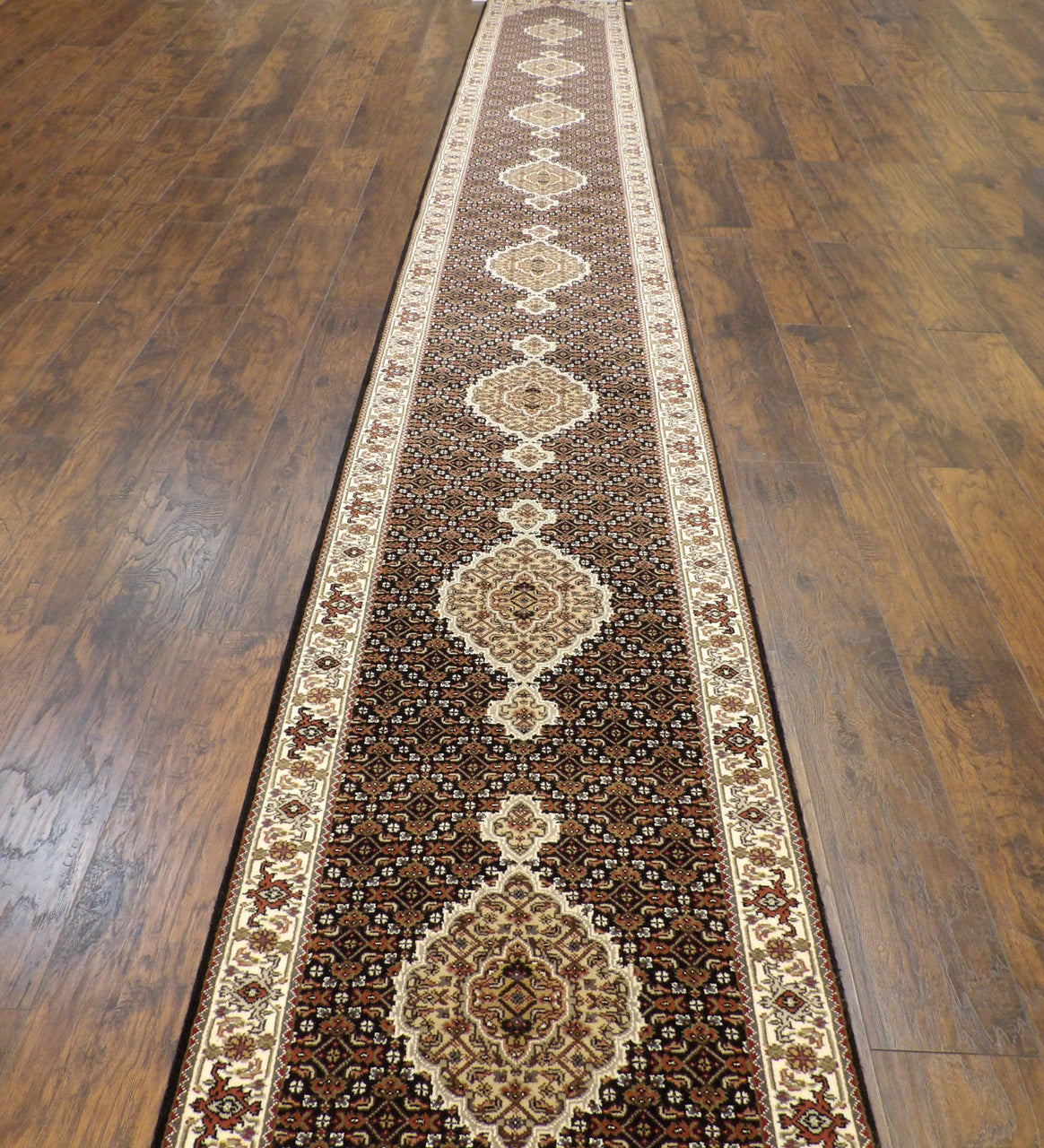 Close-up of wool-silk pile, black and ivory runner
