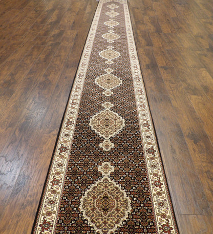 Close-up of wool-silk pile, black and ivory runner