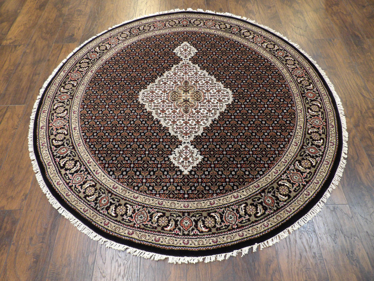 Fine Persian Mahi Tabriz rug corner detail