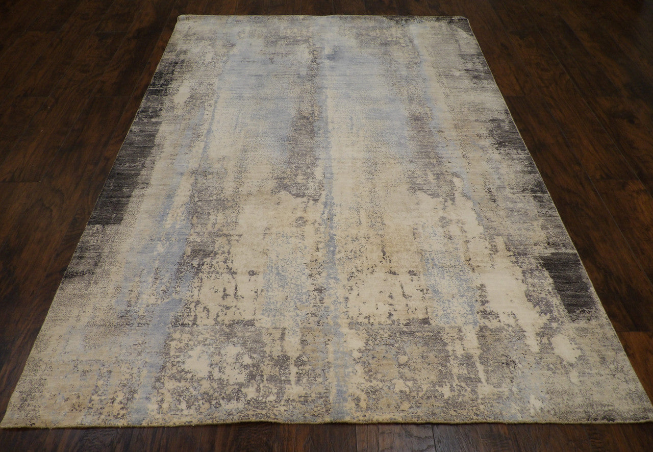 Close-up of silky wool-silk pile, blue and gray rug