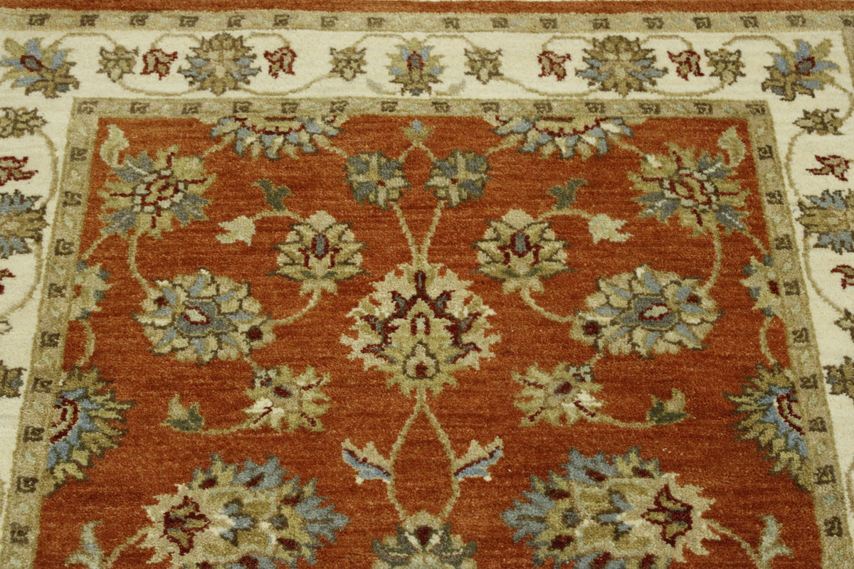 Beige & Rust Oushak Agra Chobi rug in room setting