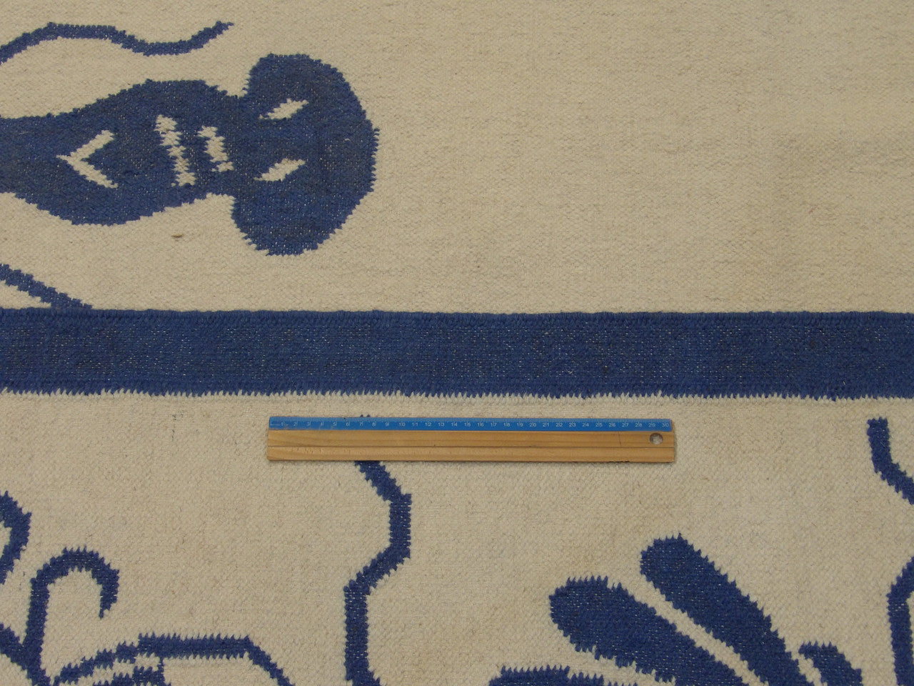 Blue & White Coastal Flat Weave Indoor/Outdoor rug in room setting