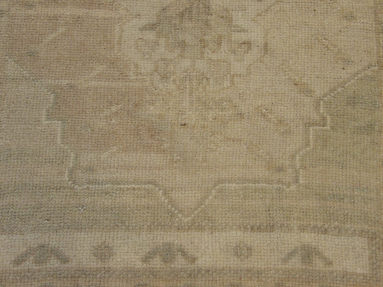 Yastik rug edge and fringe detail, beige