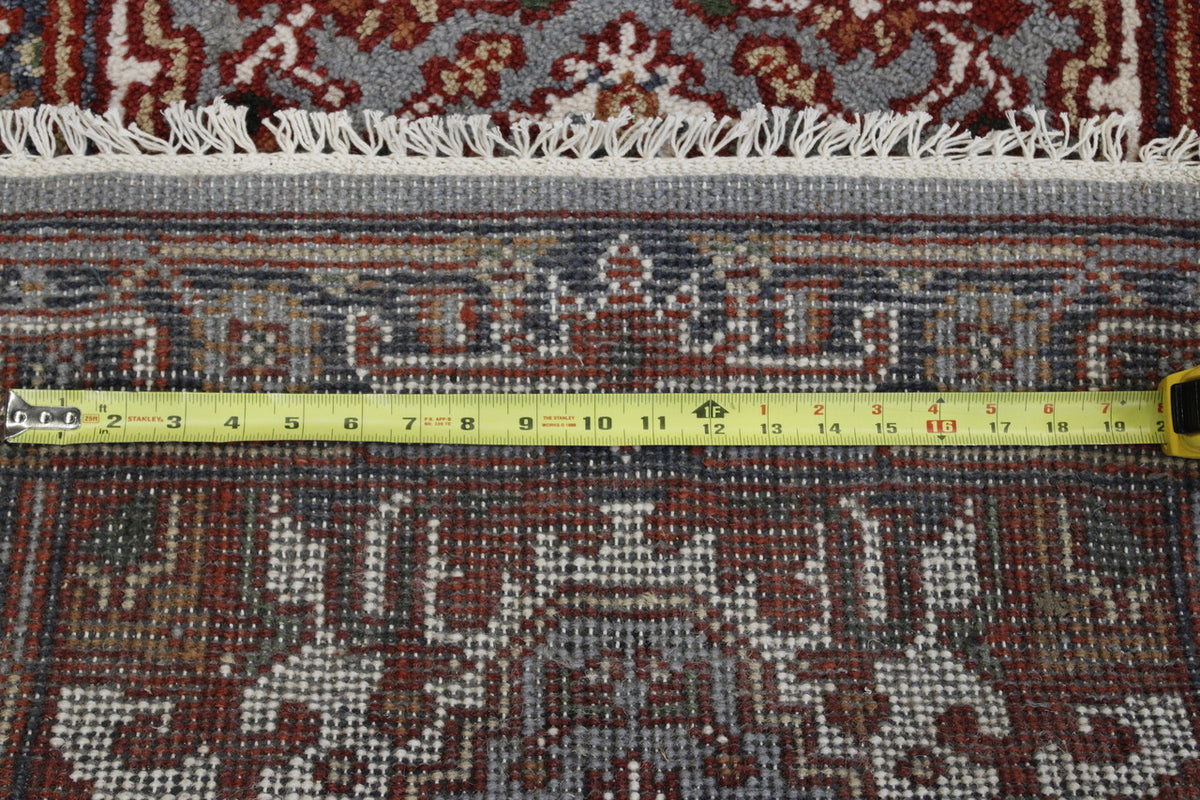 Tribal Indo Heriz rug corner detail