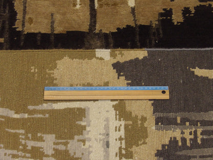 Blue and beige abstract rug in room setting