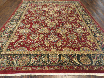 Close-up of wool pile, green and red rug