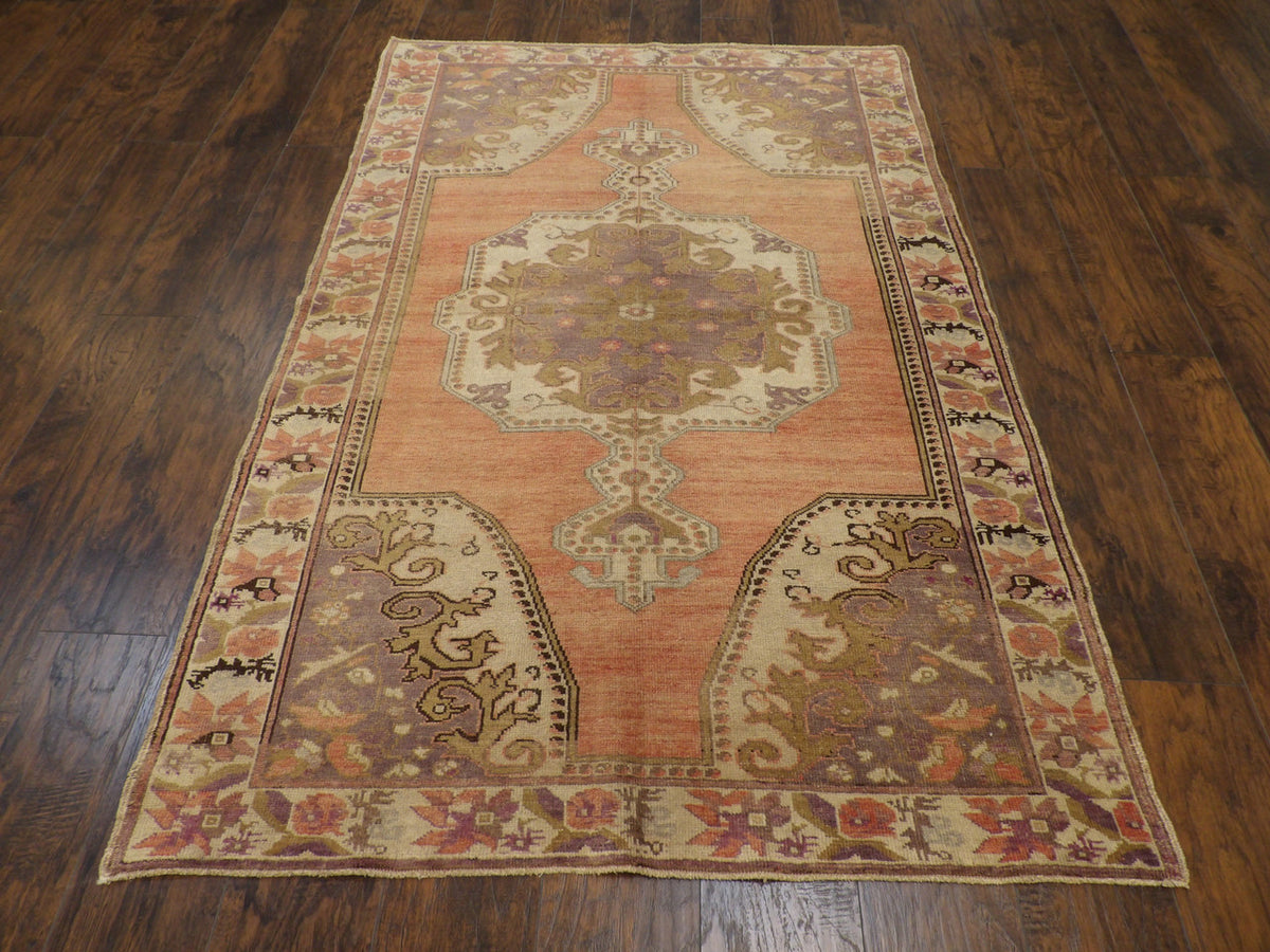 Close-up of wool pile, pink and purple rug