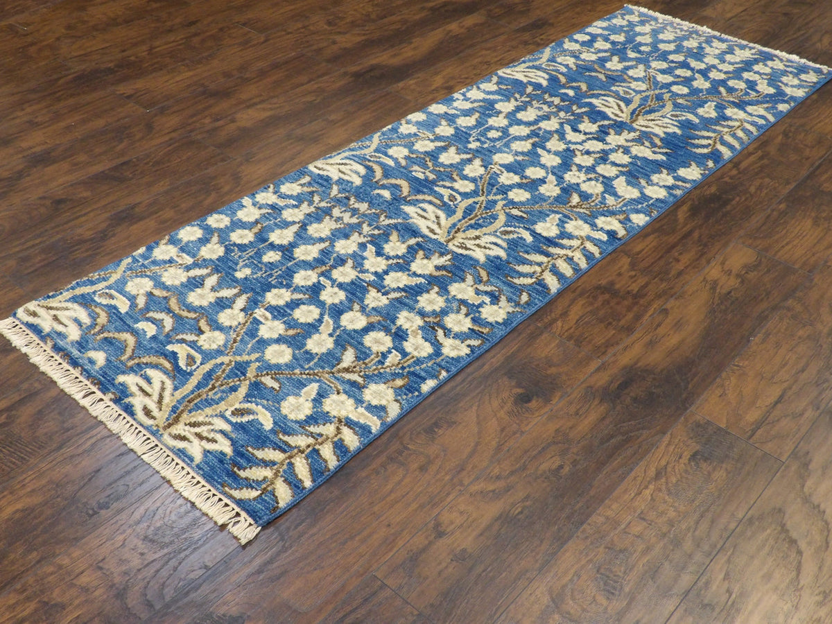 Floral pattern detail, blue and beige runner