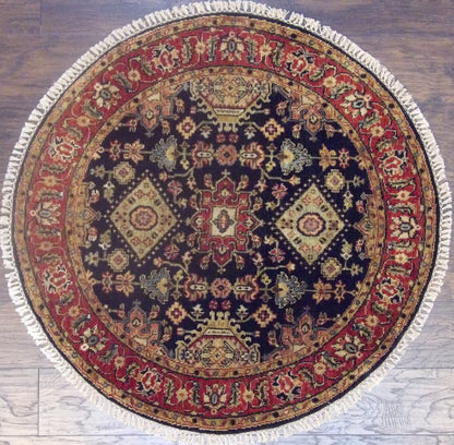 Tribal fine Serapi hand-knotted wool round rug in blue and red, full view