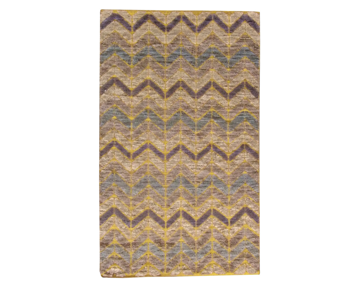 Moroccan design hand-knotted wool rug in blue and gold, full view