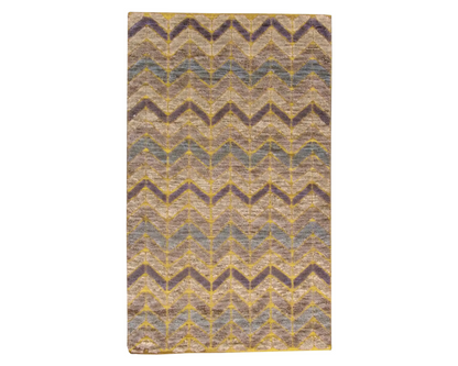 Moroccan design hand-knotted wool rug in blue and gold, full view