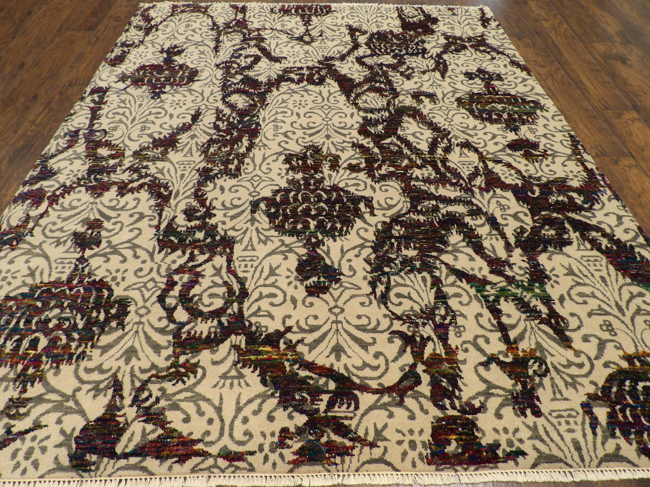 Close-up of sari silk-wool pile, beige and red rug
