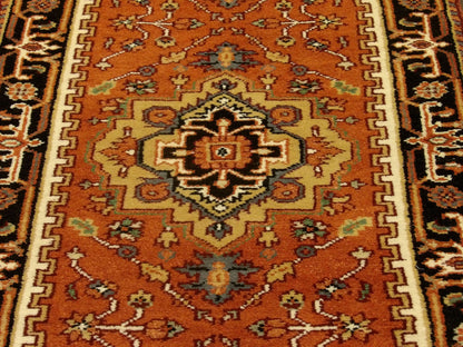 Back of Tribal Heriz hand-knotted rug