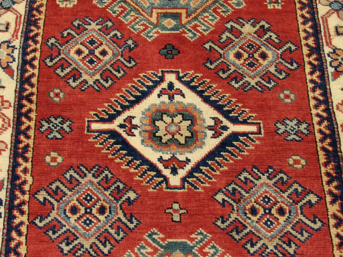 Back of Kazak hand-knotted rug