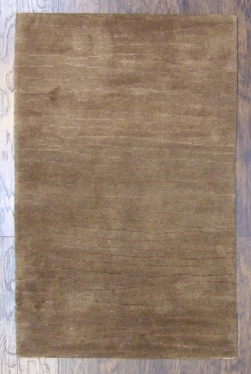 Plain modern hand-knotted wool-silk rug in brown, full view