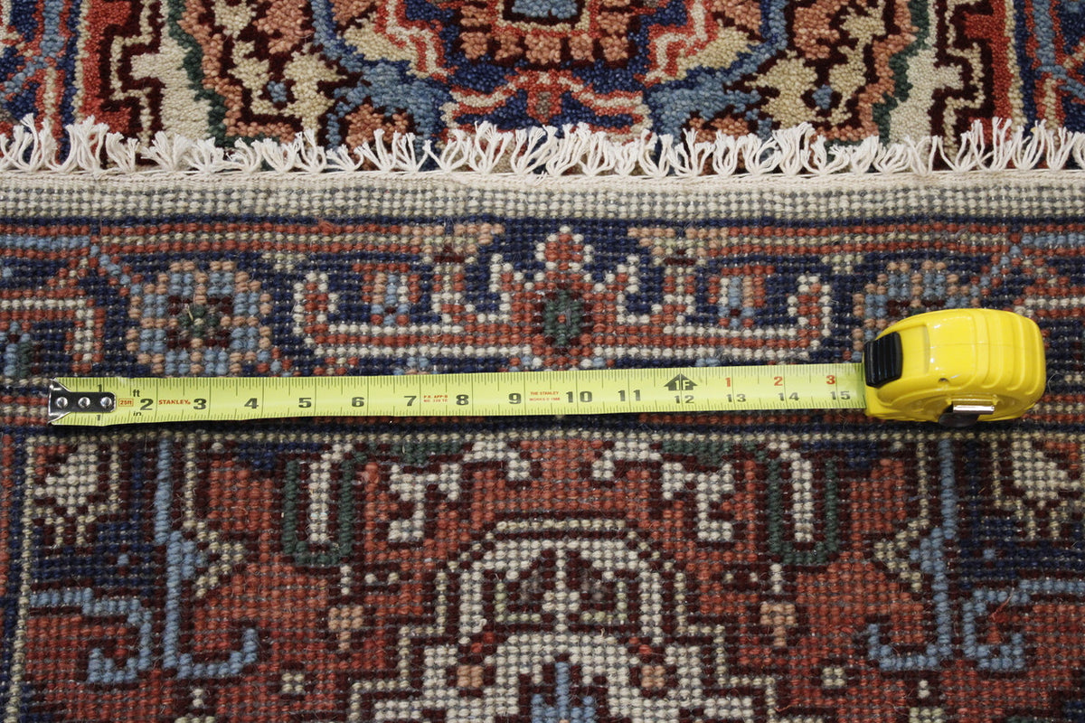 Back of Tribal Heriz hand-knotted rug