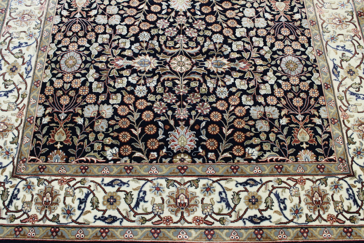 Blue & Beige Traditional Fine Heraki rug in room setting