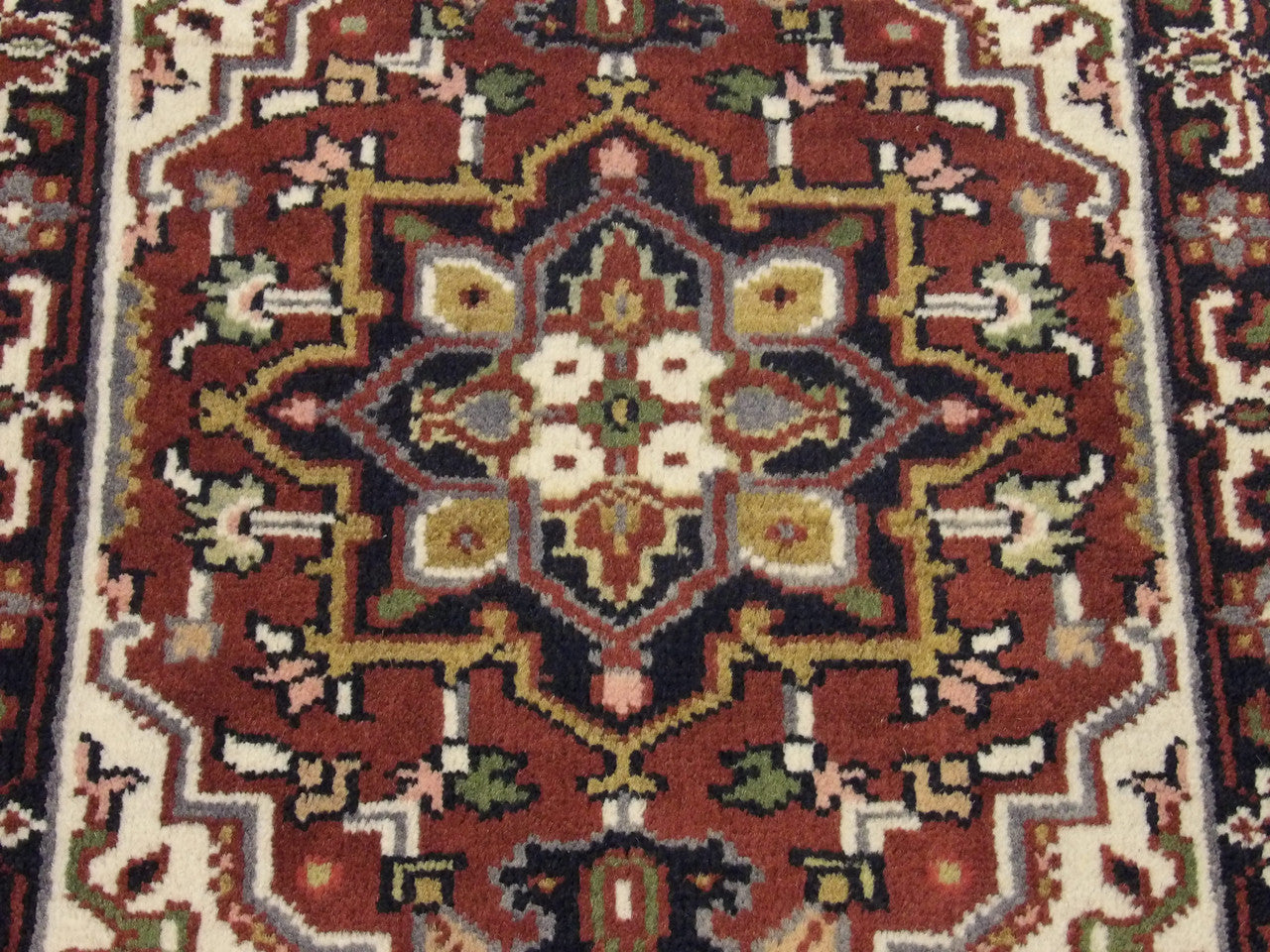 Back of Tribal Heriz hand-knotted rug