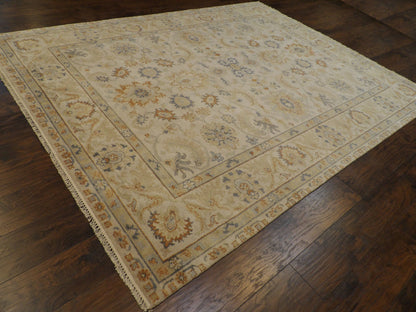 Beige and blue Oushak rug in a living room setting