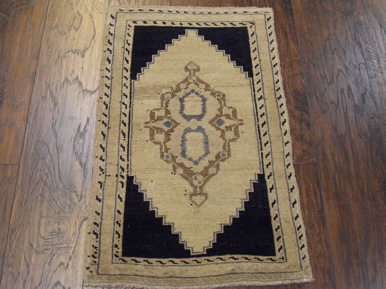 Back of hand-knotted antique Yastik rug showing construction