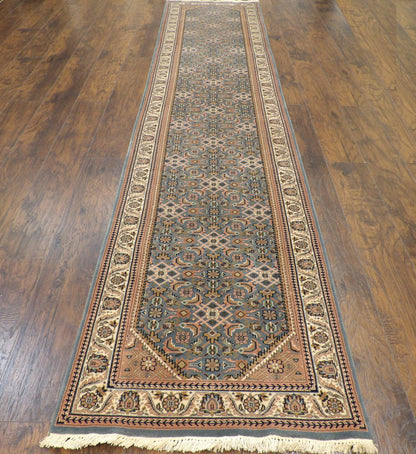 Beige Bidjar runner in a gallery hallway setting