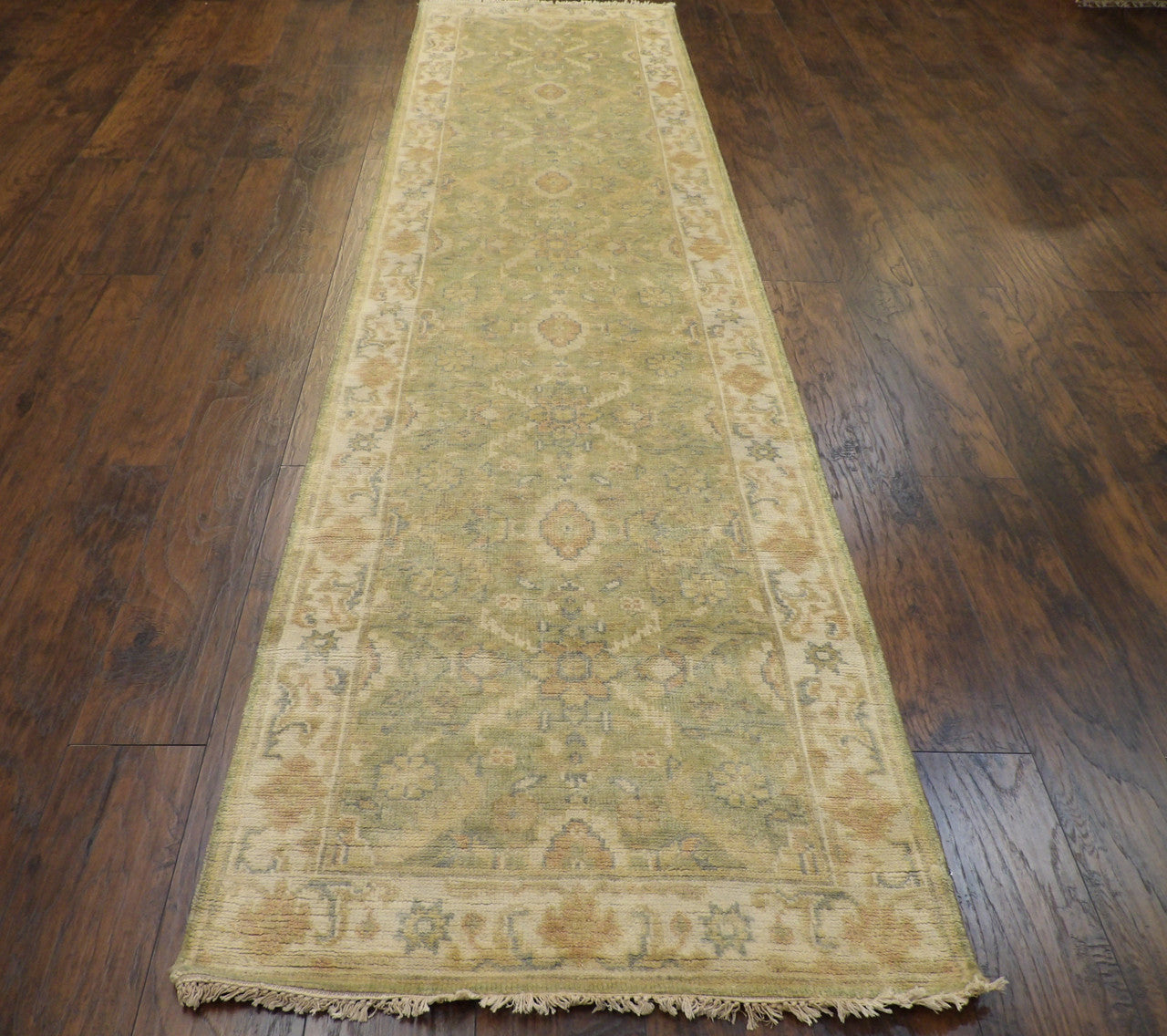 Back of hand-knotted Oushak runner showing construction