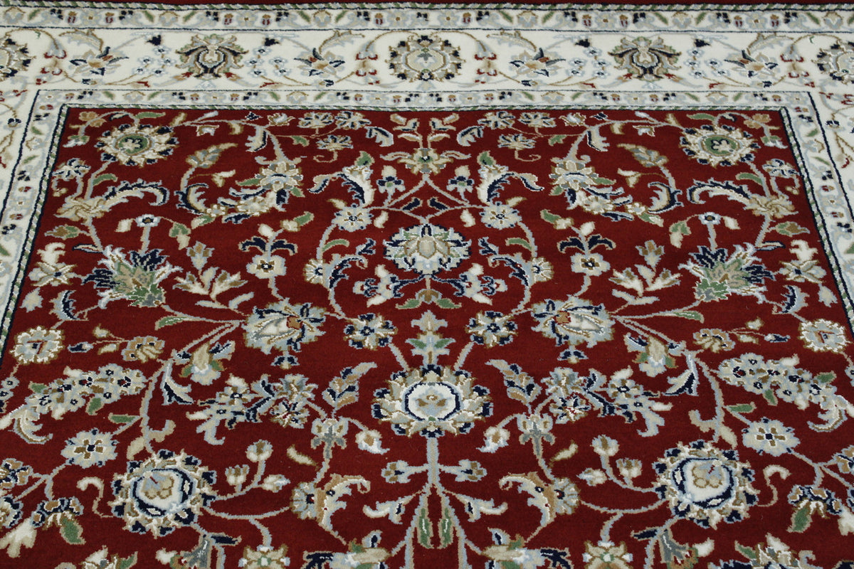 Beige & Red Traditional Fine Nain rug in room setting
