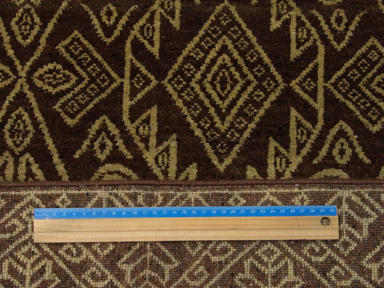 Full room view of transitional Ikat hand-knotted rug