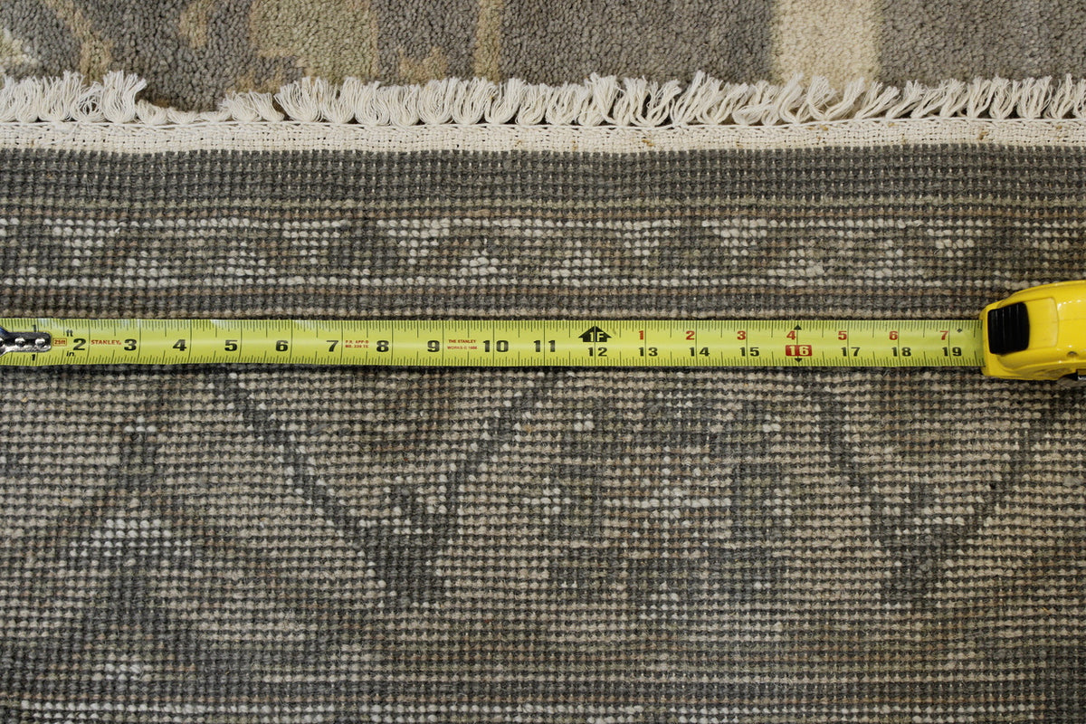 Green & Beige Oushak Indo Ziegler rug in room setting