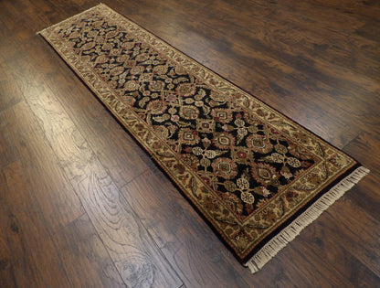 Black and gold Kashan runner in a hallway setting