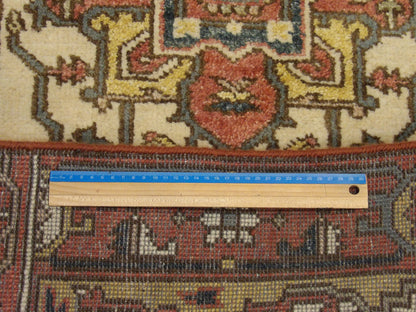 Beige & Rust Fine Persian Heriz rug in room setting