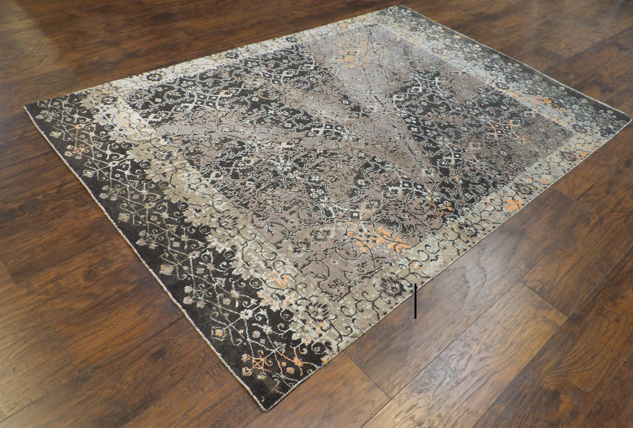 Black oxidized rug in a room setting