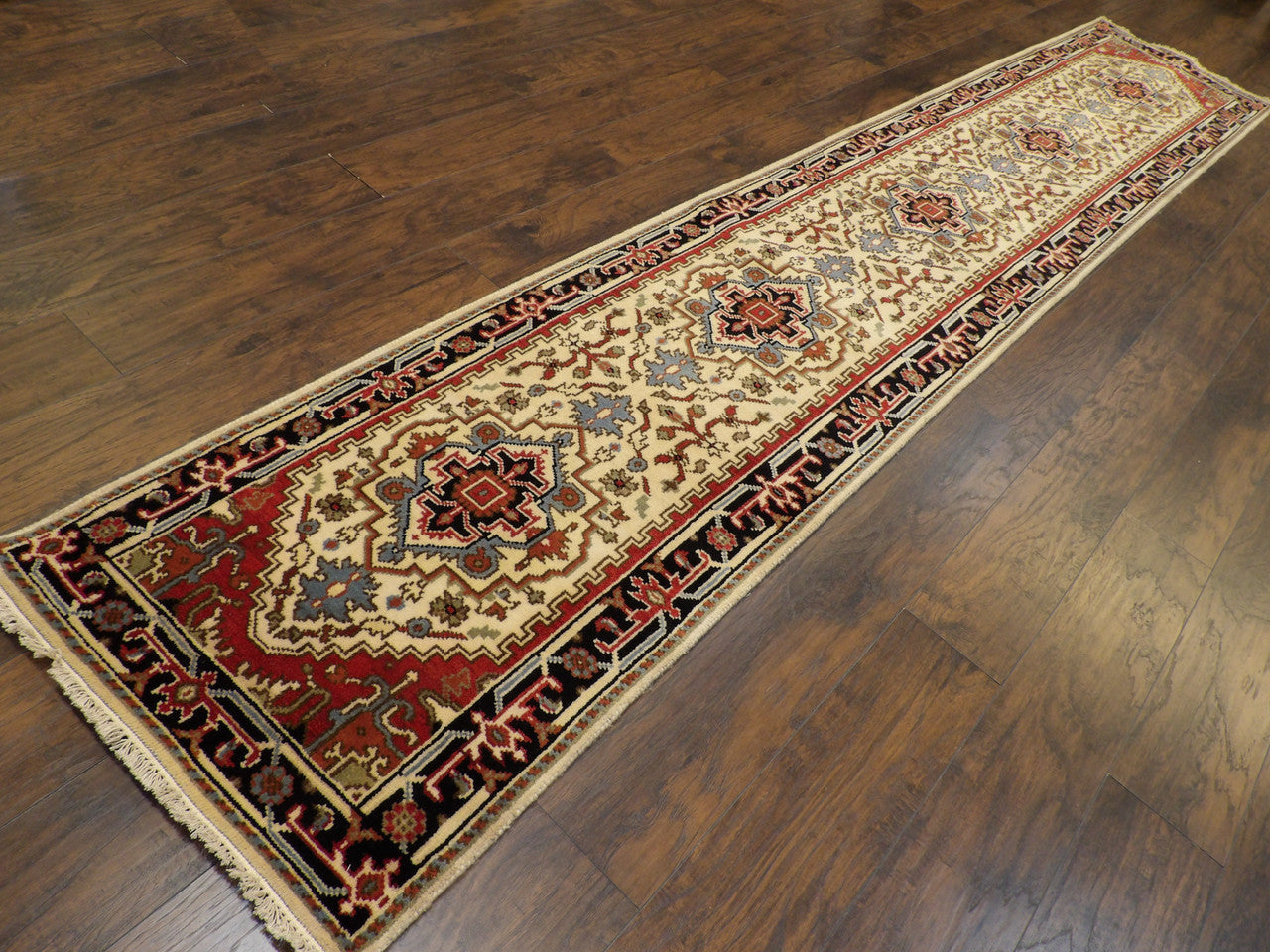 Heriz medallion pattern detail, beige and black runner