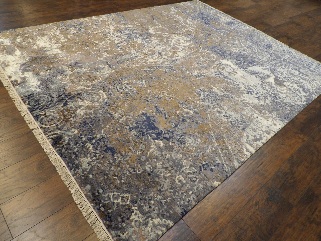 Damask pattern detail, oxidized blue rug