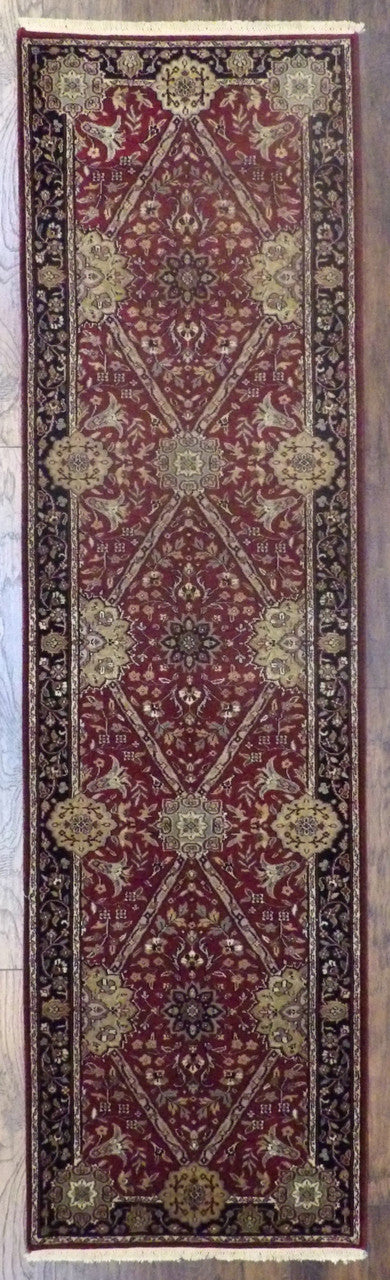 Fine Persian Tabriz hand-knotted wool runner in black and red, full view