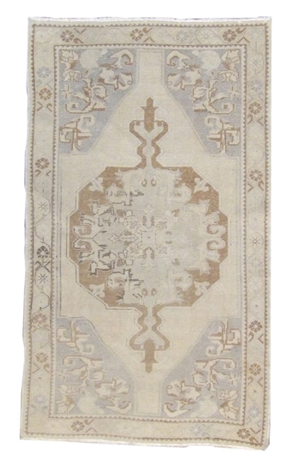 Anatolian vintage Oushak hand-knotted wool rug in blue and brown, full view