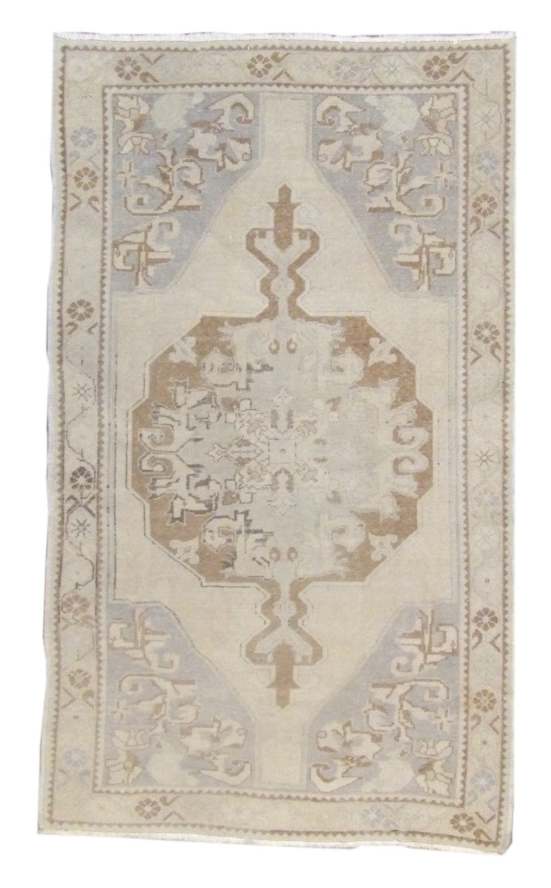 Anatolian vintage Oushak hand-knotted wool rug in blue and brown, full view