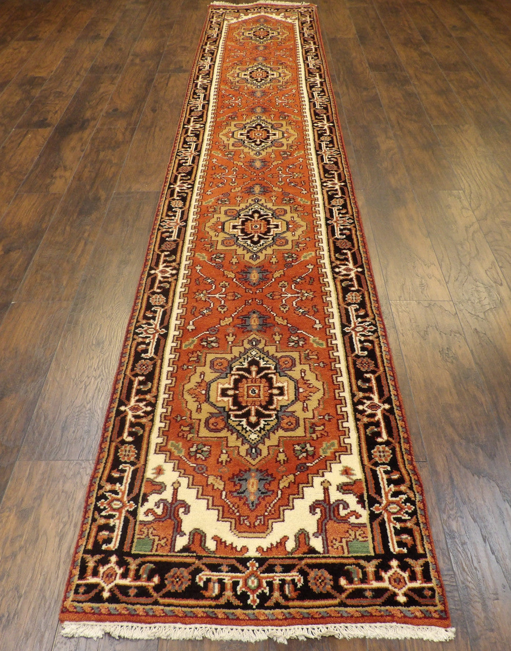 Tribal Heriz rug corner detail