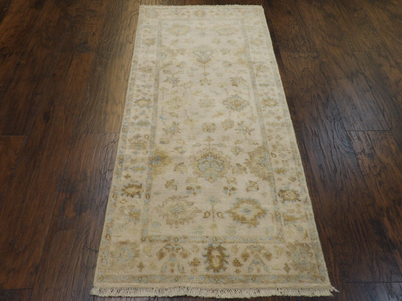 Ivory Oushak runner in hallway setting