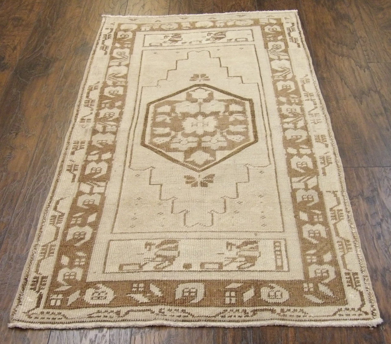 Close-up of wool pile, brown and gray rug