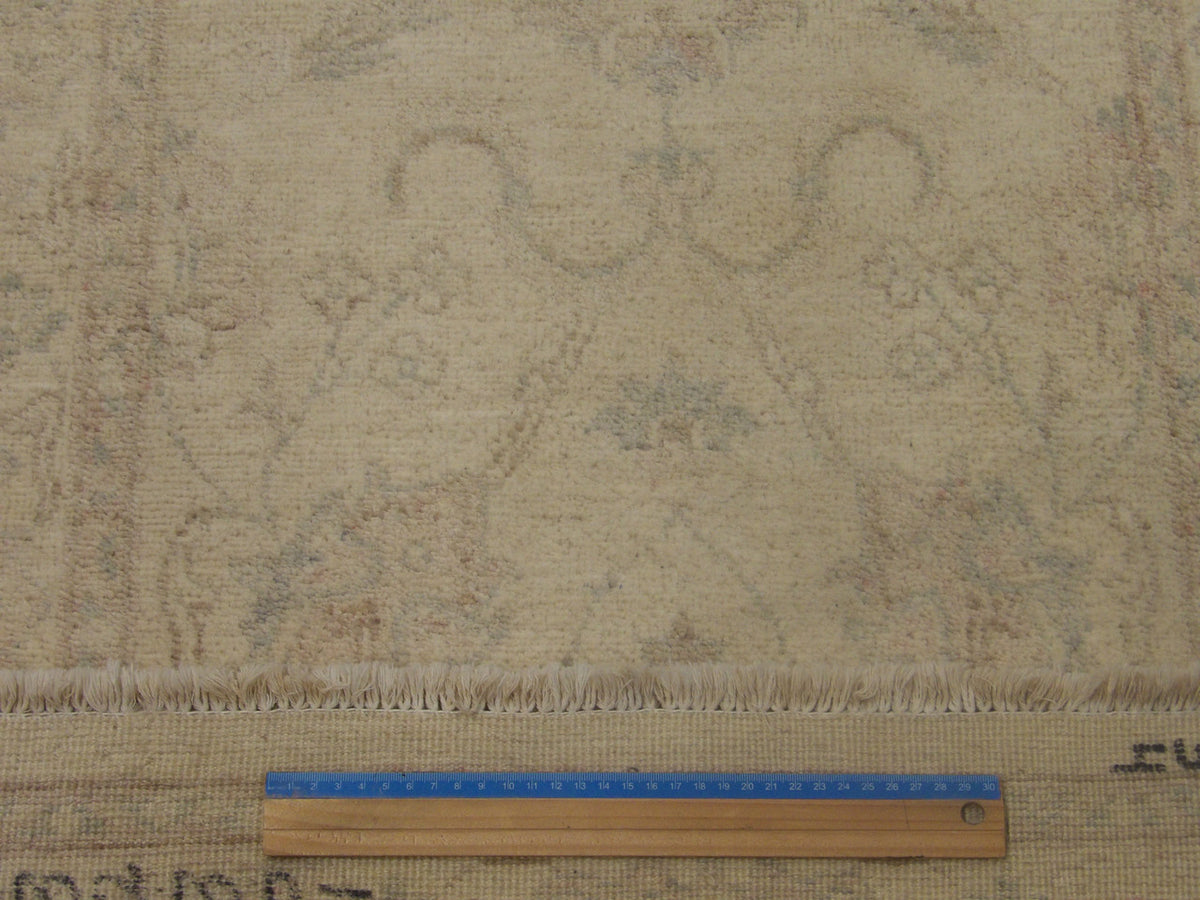 Ivory Oushak Chobi Wash rug in room setting